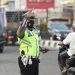Potret Bripka Roy Muhammad Iskandar, SH saat mengatur arus lalulintas di Kota Jambi